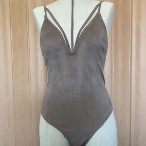 Suede like tan body suit with tie to neck